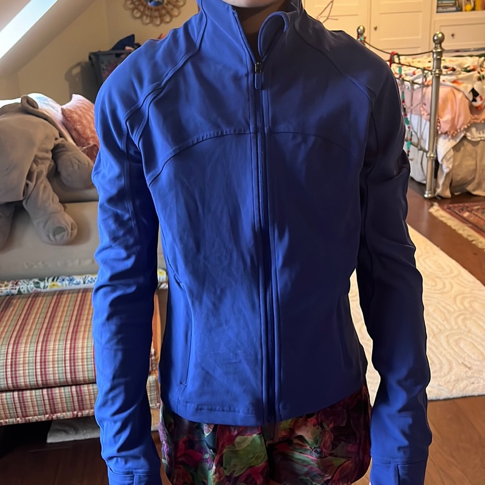 It’s dark purple, never been worn, Is from Lululemon.